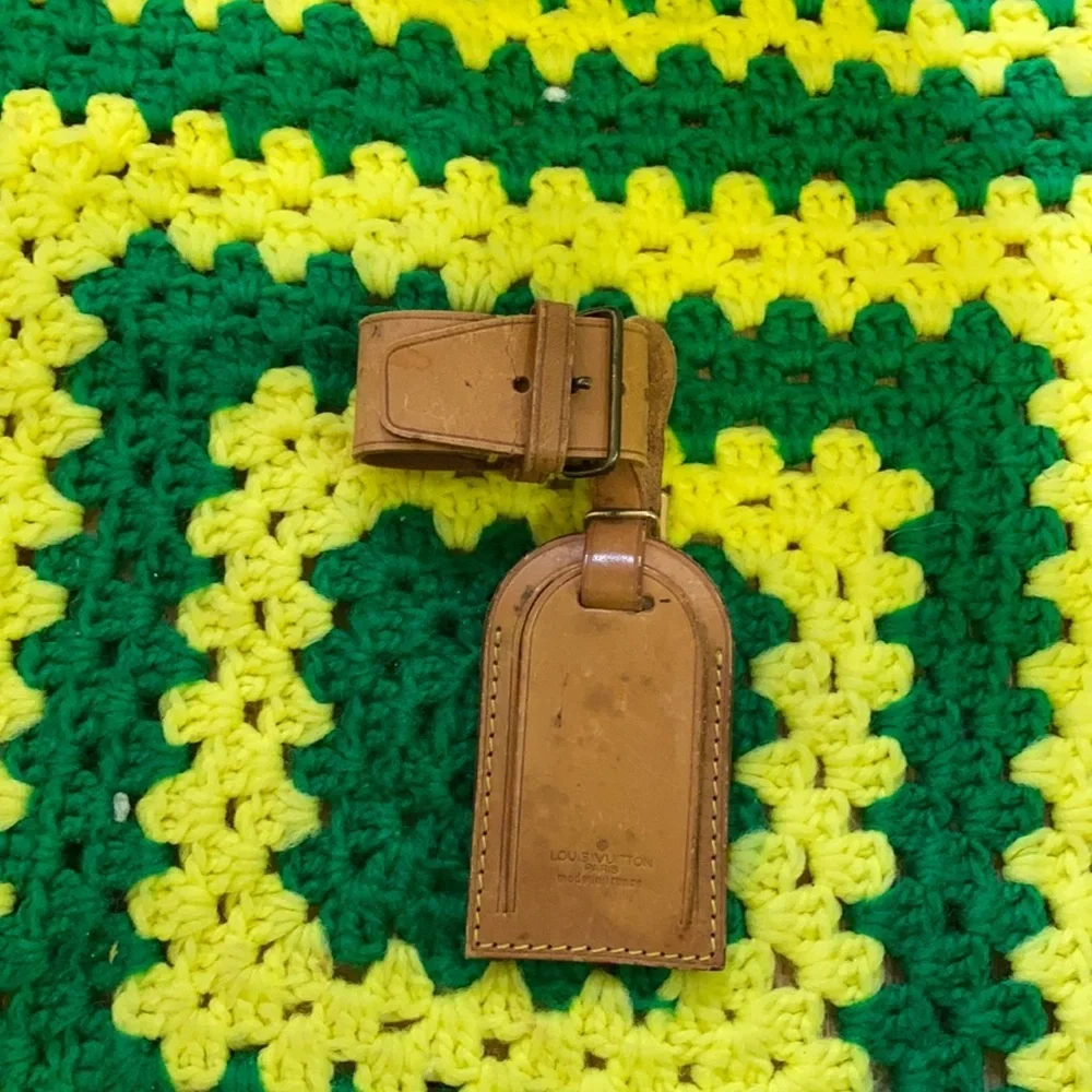 Louis Vuitton luggage tag and poi get
